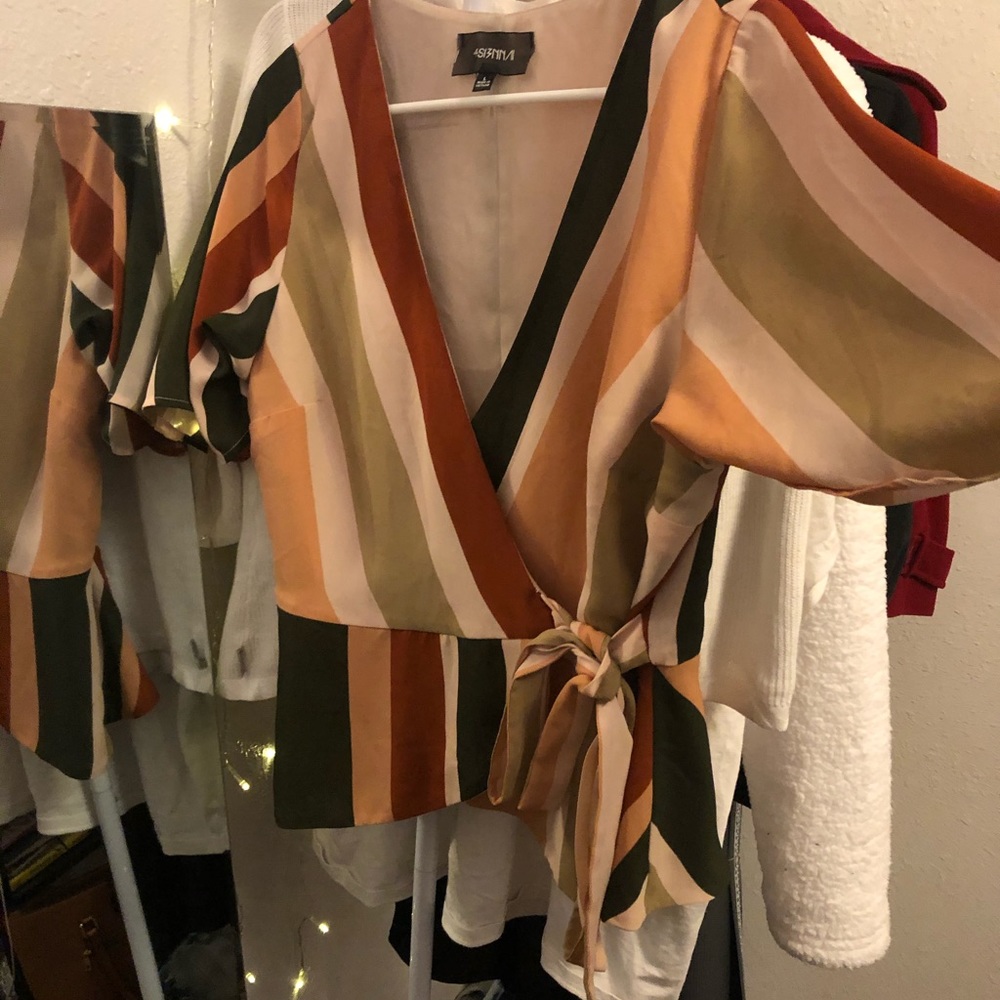 Mutely colorful peplum blouse